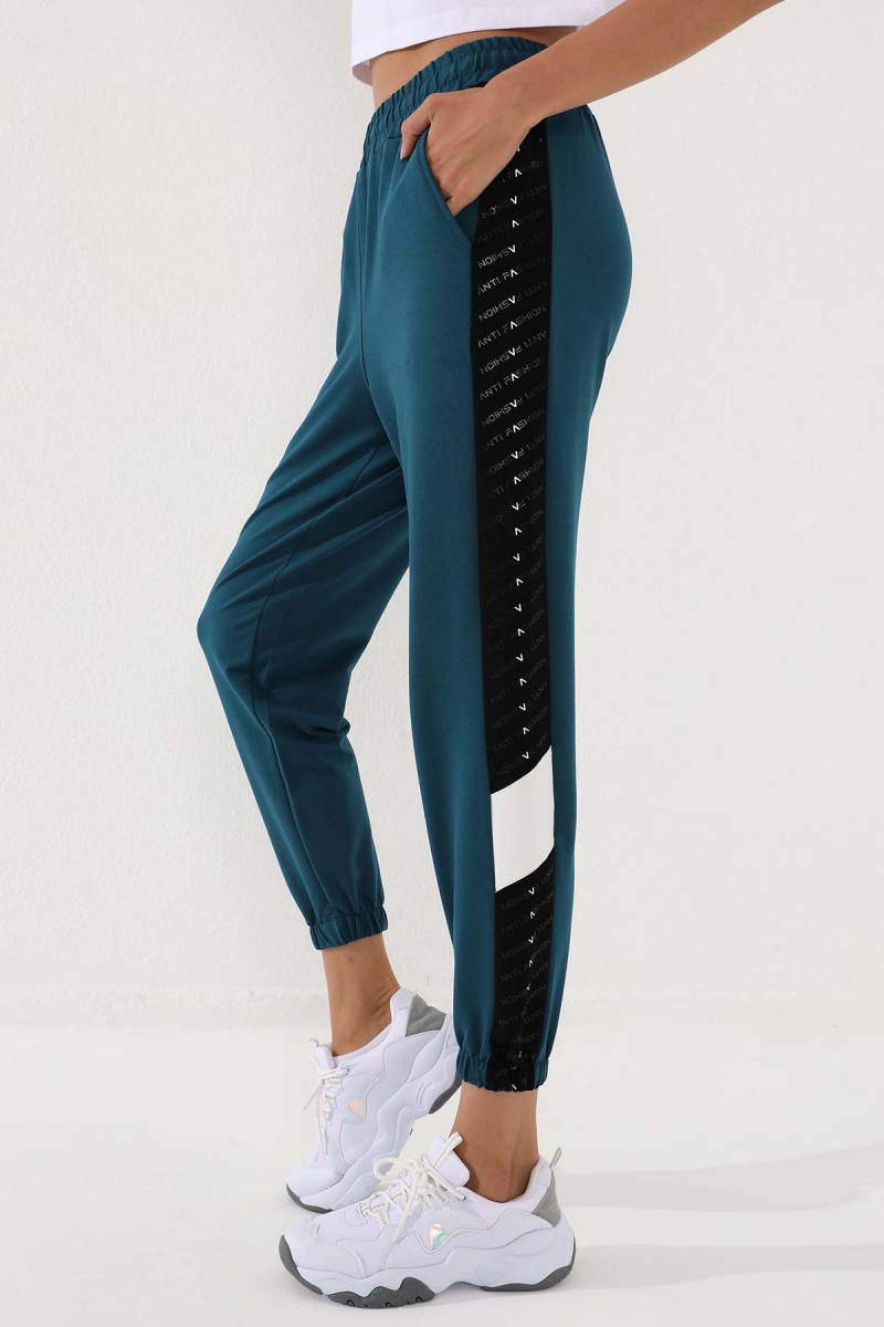 Tommy Life Zümrüt Noktalı Şerit Detaylı Jogger Rahat Form Jogger Kadın Eşofman Alt - 94579. 2 Tommy Life Zümrüt Noktalı Şerit Detaylı Jogger Rahat Form Jogger Kadın Eşofman Alt - 94579. 2
