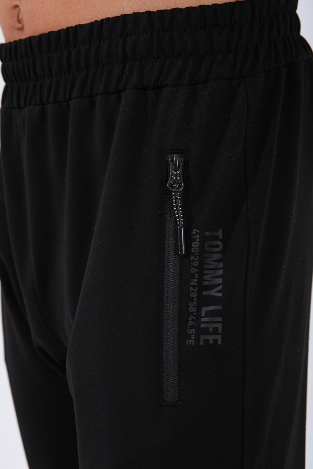 Tommy Life Haki - Siyah Dik Yaka Yazı Baskılı Standart Kalıp Manşetli Erkek Eşofman Takımı - 85149. 13 Tommy Life Haki - Siyah Dik Yaka Yazı Baskılı Standart Kalıp Manşetli Erkek Eşofman Takımı - 85149. 13