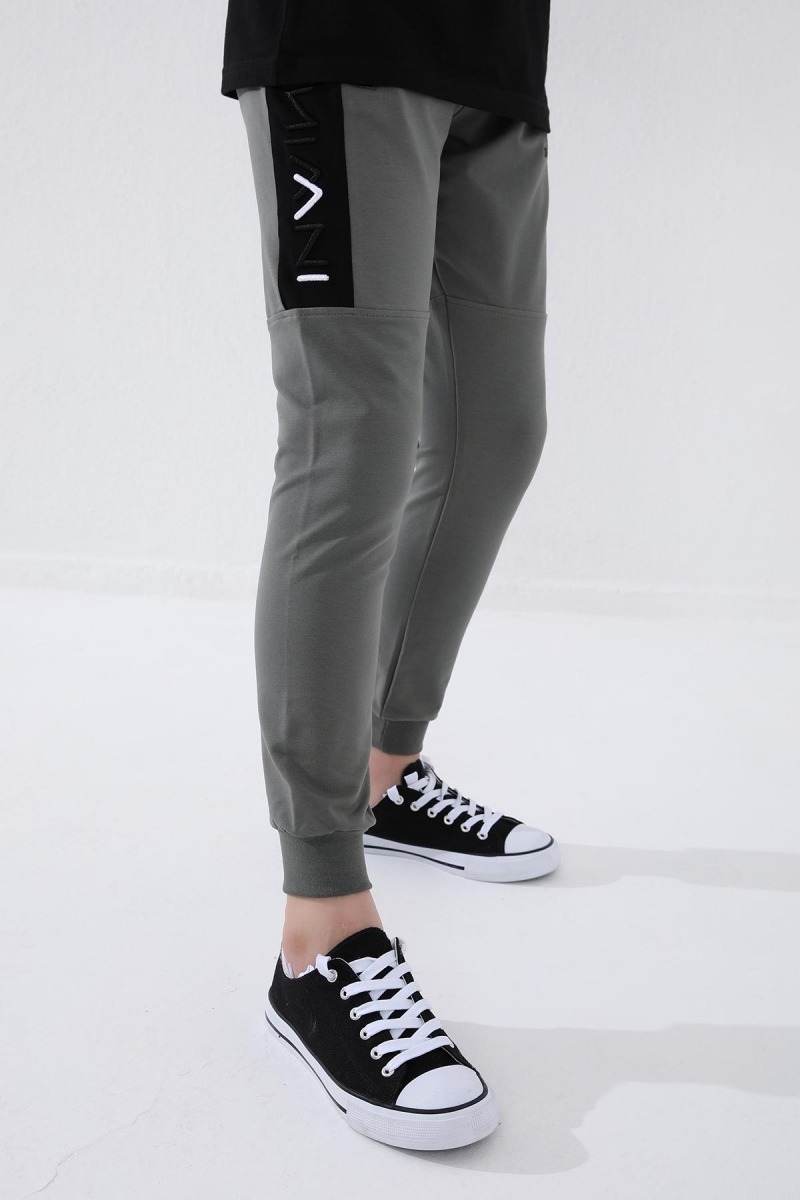 Tommy Life Çağla Erkek Çocuk Yazı Nakışlı Yarım Şeritli Jogger Dar Kalıp Manşetli Eşofman Alt - 64050. 10 Tommy Life Çağla Erkek Çocuk Yazı Nakışlı Yarım Şeritli Jogger Dar Kalıp Manşetli Eşofman Alt - 64050. 10