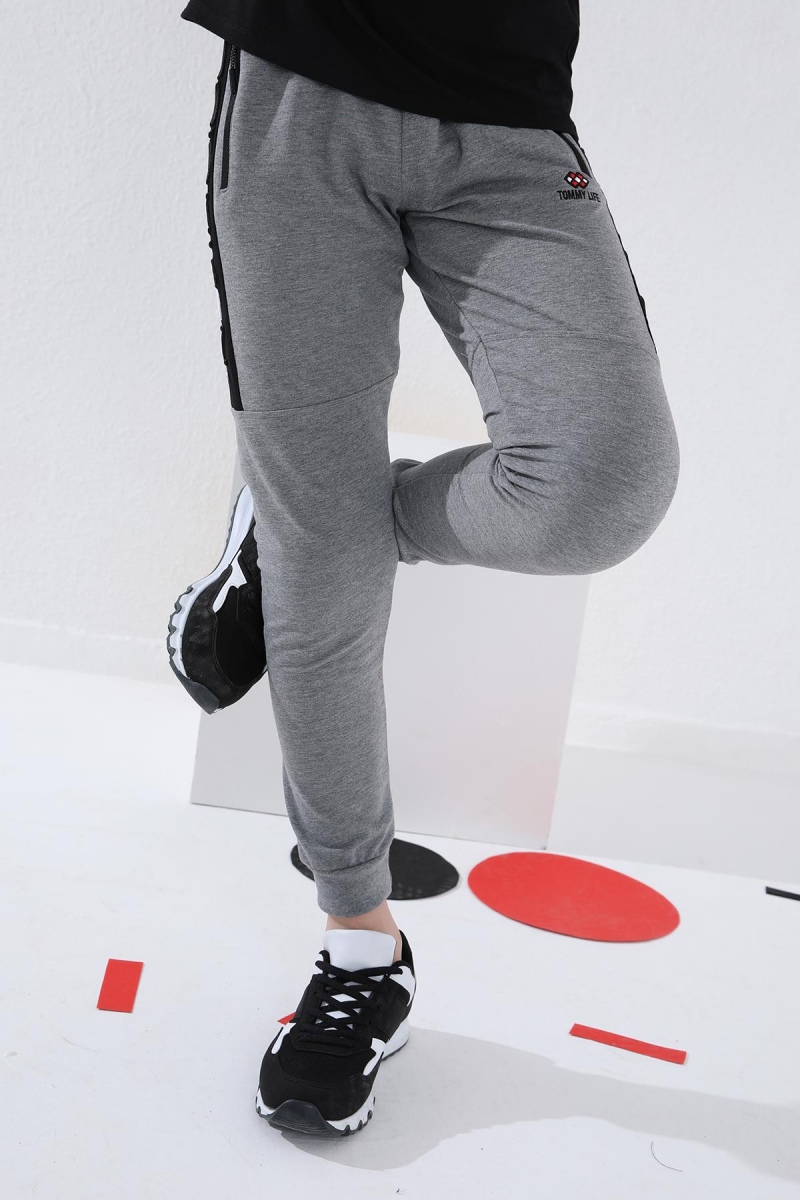 Tommy Life Gri Melanj Erkek Çocuk Yazı Nakışlı Yarım Şeritli Jogger Dar Kalıp Manşetli Eşofman Alt - 64050. 12 Tommy Life Gri Melanj Erkek Çocuk Yazı Nakışlı Yarım Şeritli Jogger Dar Kalıp Manşetli Eşofman Alt - 64050. 12