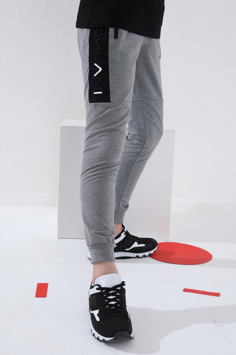 Tommy Life Gri Melanj Erkek Çocuk Yazı Nakışlı Yarım Şeritli Jogger Dar Kalıp Manşetli Eşofman Alt - 64050. 3 Tommy Life Gri Melanj Erkek Çocuk Yazı Nakışlı Yarım Şeritli Jogger Dar Kalıp Manşetli Eşofman Alt - 64050. 3