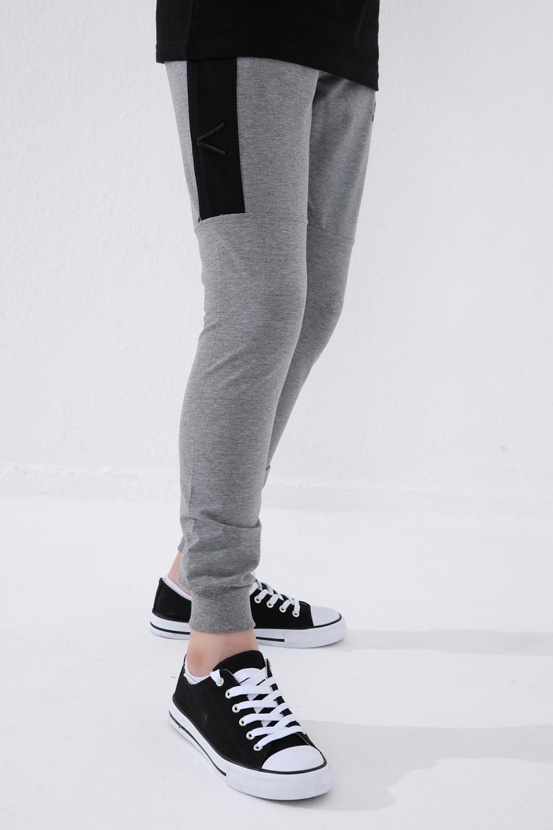 Tommy Life Gri Melanj Erkek Çocuk Yazı Nakışlı Yarım Şeritli Jogger Dar Kalıp Manşetli Eşofman Alt - 64046. 8 Tommy Life Gri Melanj Erkek Çocuk Yazı Nakışlı Yarım Şeritli Jogger Dar Kalıp Manşetli Eşofman Alt - 64046. 8