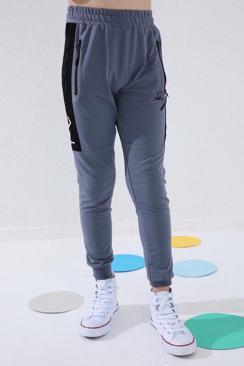 Tommy Life Petrol Erkek Çocuk Yazı Nakışlı Yarım Şeritli Jogger Dar Kalıp Manşetli Eşofman Alt - 64050. 6 Tommy Life Petrol Erkek Çocuk Yazı Nakışlı Yarım Şeritli Jogger Dar Kalıp Manşetli Eşofman Alt - 64050. 6
