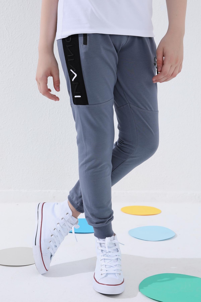 Tommy Life Petrol Erkek Çocuk Yazı Nakışlı Yarım Şeritli Jogger Dar Kalıp Manşetli Eşofman Alt - 64050. 1 Tommy Life Petrol Erkek Çocuk Yazı Nakışlı Yarım Şeritli Jogger Dar Kalıp Manşetli Eşofman Alt - 64050. 1