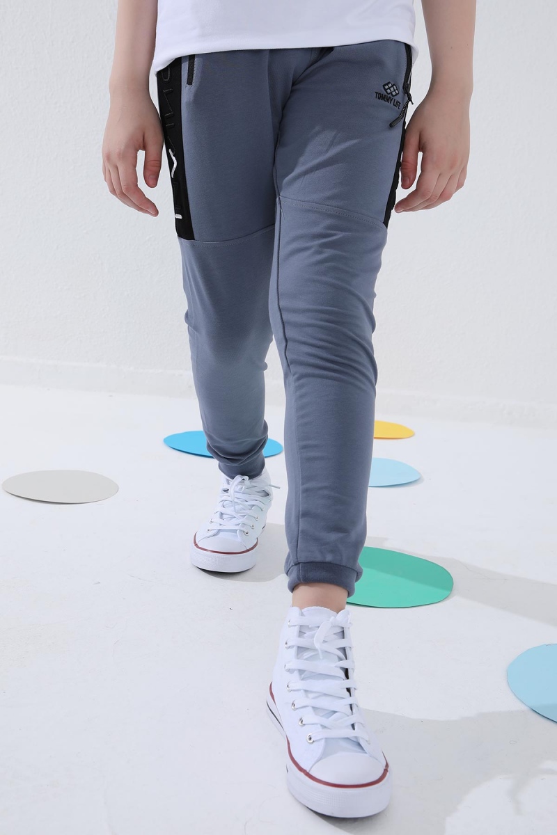 Tommy Life Petrol Erkek Çocuk Yazı Nakışlı Yarım Şeritli Jogger Dar Kalıp Manşetli Eşofman Alt - 64050. 12 Tommy Life Petrol Erkek Çocuk Yazı Nakışlı Yarım Şeritli Jogger Dar Kalıp Manşetli Eşofman Alt - 64050. 12